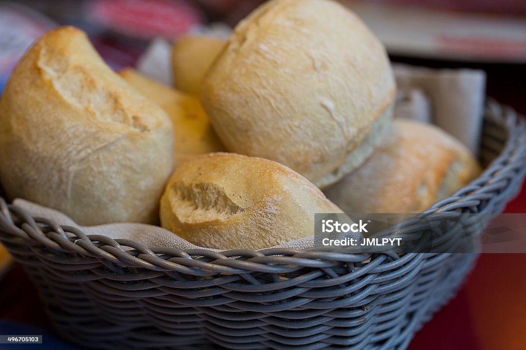 Bread in a gray basket on a table little bread in a basket Bread Stock Photo