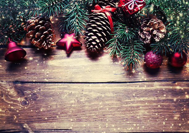 istock Christmas fir tree with decoration on dark wooden board. 496705248
