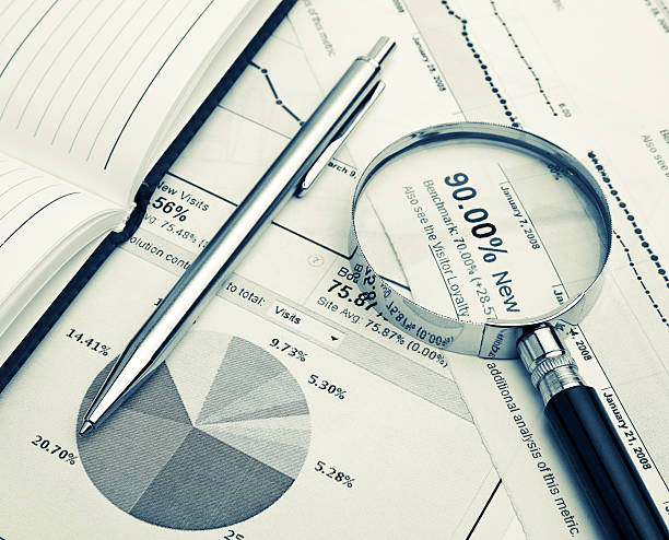 istock financial charts and graphs on the table 496705413