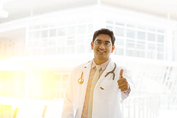 istock Asian Indian medical doctor thumb up 496706016
