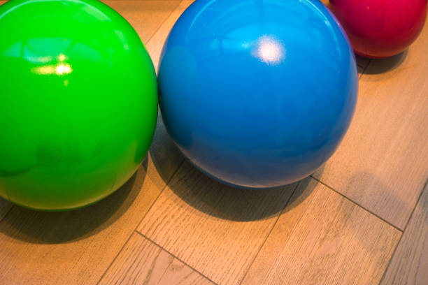 istock Colourful Balls on a wooden floor 496706230