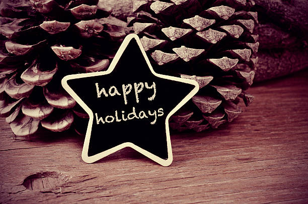 istock text happy holidays in a star-shaped blackboard 496706870