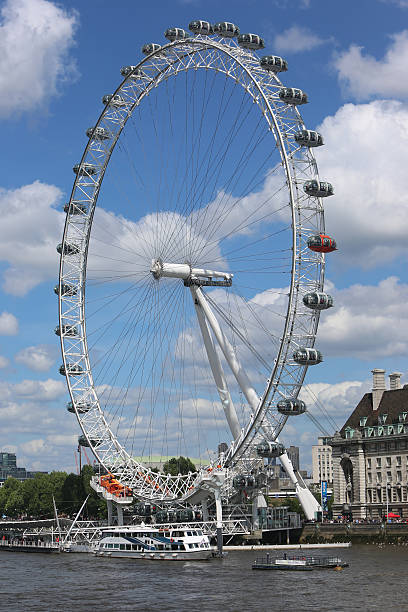 London Eye or Millennium Wheel London, United Kingdom - May 25, 2014:London Eye or Millennium Wheel view from the Westminister Bridge. arma-globalphotos stock pictures, royalty-free photos & images