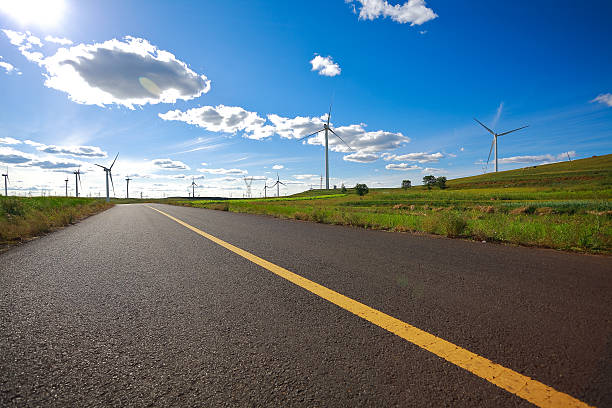 istock Eco wind power generator on the grassland 496707458