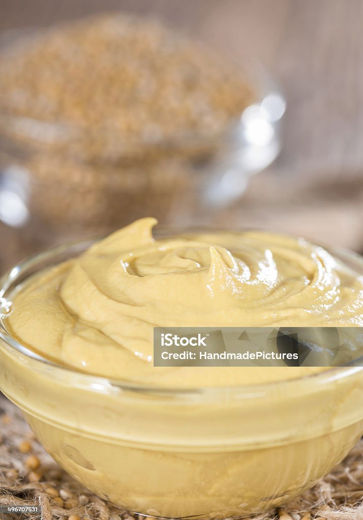 Small bowl with Mustard Small bowl with Mustard sauce (close-up shot) Appetizer Stock Photo