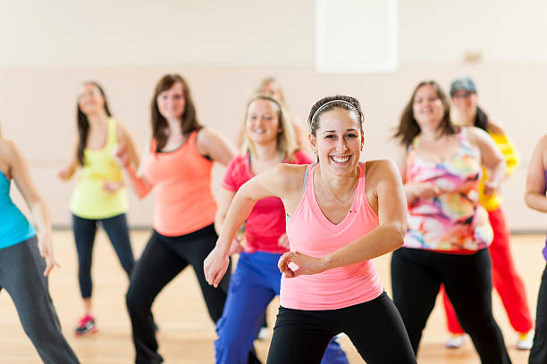Dance Fitness Group of women in dance fitness class. exercise class photos stock pictures, royalty-free photos & images