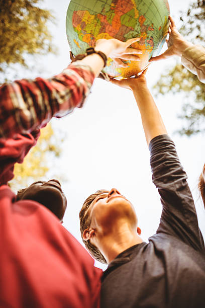 istock teenagers reaching the world at campus 496708085
