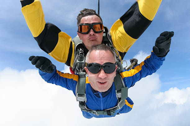 istock Skydiving photo. Tandem. 496708222