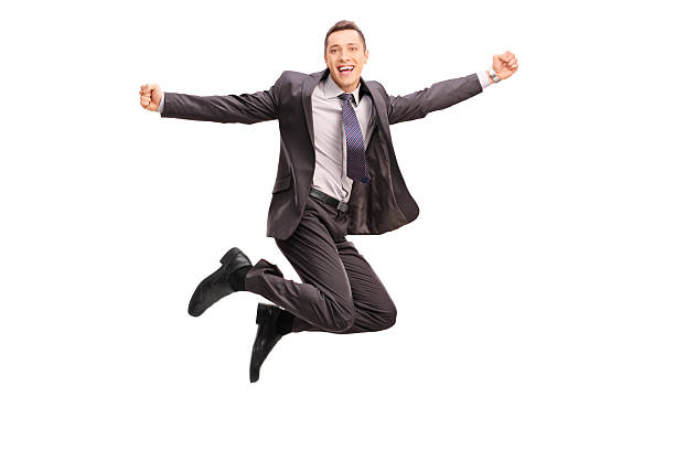 istock Overjoyed businessman jumping and gesturing happiness 496709888