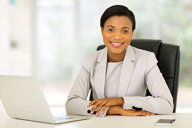 istock afro american businesswoman working in office 496709958