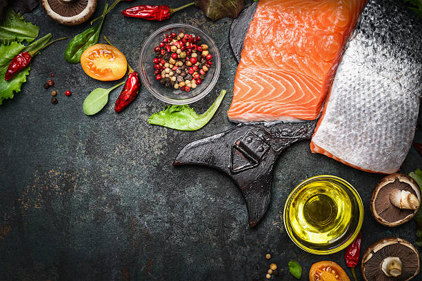 istock Salmon fillet with delicious ingredients for cooking 496710914