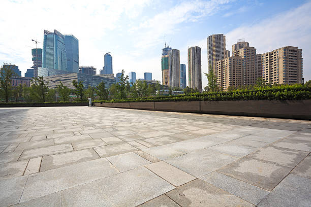 istock Empty marble floor with city building background 496711156