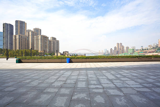 istock Empty marble floor with city building background 496711324