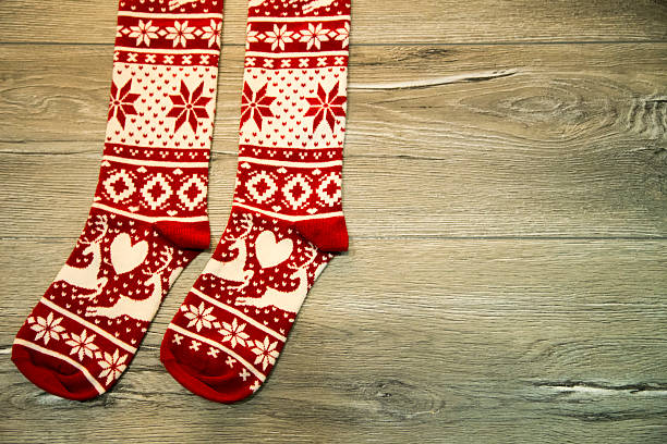 istock seasonal winter socks by th Christmas decoration 496711368