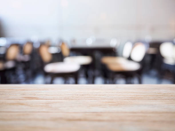 istock Table top counter with seats Blur Bar Restaurant background 496713382