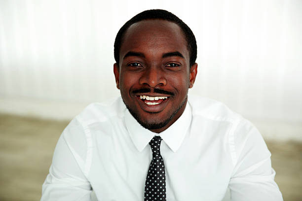 istock Portrait of a laughing african man 496718779