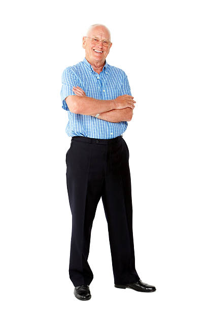 istock Happy senior man standing on white 496719919