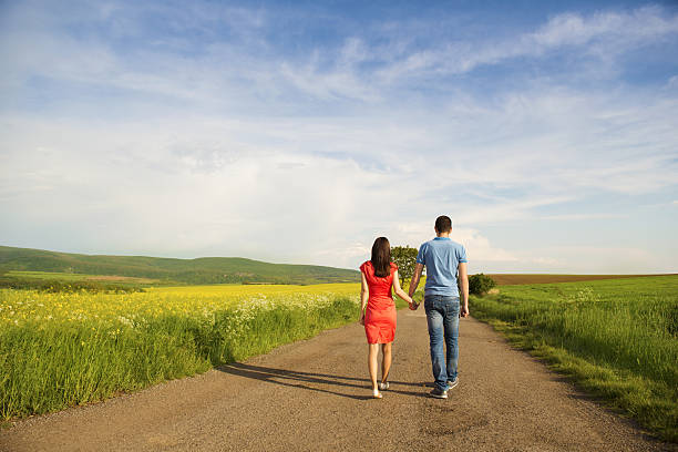 istock Couple in love on countryside road 496721597