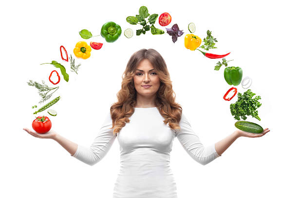 istock smiling woman with vegetables isolated 496722197