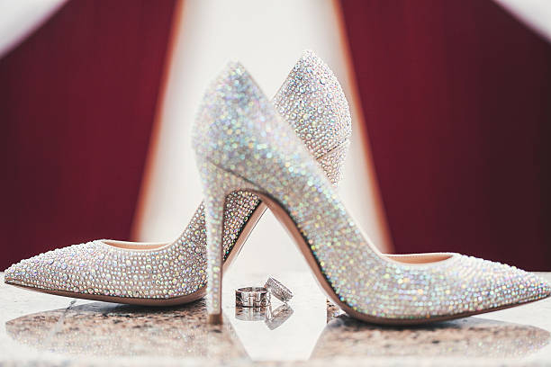 Wedding-ring and woomen shoes acute coe Wedding-ring and woomen shoes acute coe wedding shoes stock pictures, royalty-free photos & images