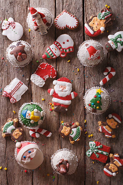 istock Christmas sweets closeup on a wooden table. vertical top view 496725494