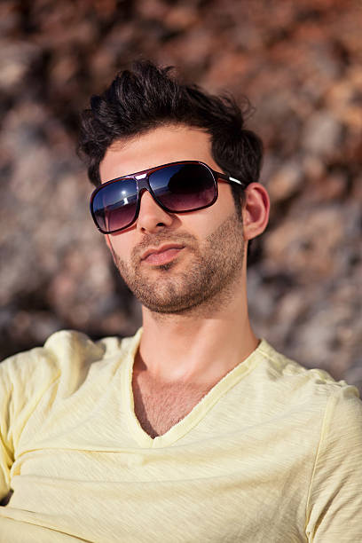 istock Casual young man with sunglasses 496725503