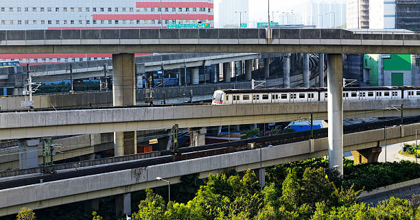 istock Suburban Commuter Train Speeding Through Station 496725605