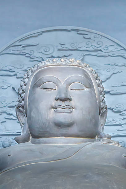 fat buddha-statue - iron asian culture buddhism buddha stock-fotos und bilder