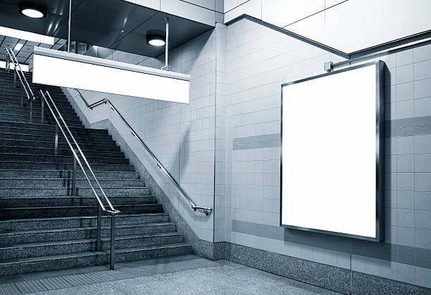 istock Billboard and direction signage mock up in subway with stairs 496727296