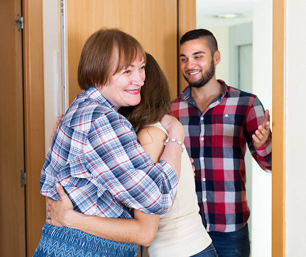 istock Adults people greeting mother 496727826
