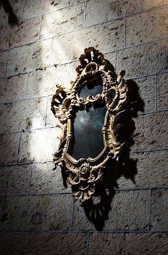 This is an antique mirror in a cathedral