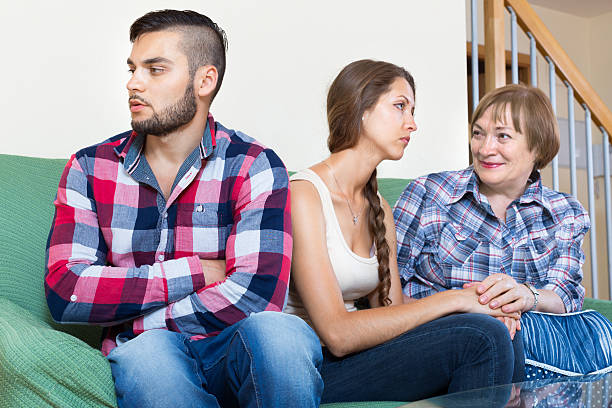 istock Mother comforting sullen daughter 496728548