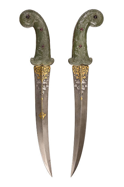 Green jade dagger antique collectable Old dagger vintage in Jade carved rare and collectible isolated on white. ancient chinese weapons stock pictures, royalty-free photos & images