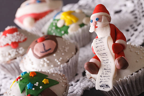 istock Christmas cupcake decorated with a fabulous Santa macro. horizon 496731546
