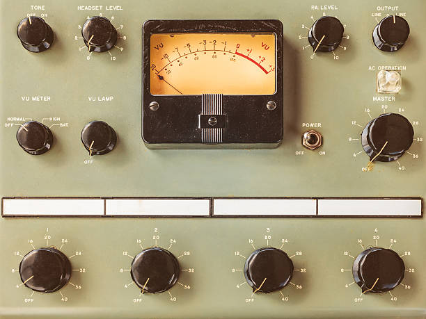 Vintage control panel with volt meter Vintage control panel with volt meter and black round knobs volume knob photos stock pictures, royalty-free photos & images