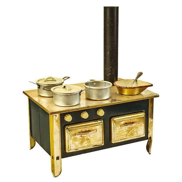 Retro doll house cooking stove isolated on white
