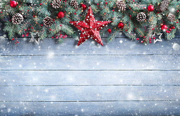 istock Fir Branch And Decoration On Snowy Plank 496732998