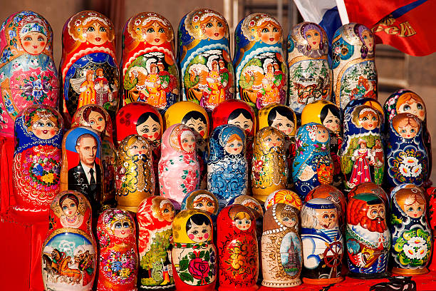 Russian traditional nested dolls "matryoshka" with portrait of Putin V.V. Moscow, Russia - March 31, 2008. Russian traditional nested dolls - matryoshka. Some dolls have a portrait of V. V. Putin, the Russian president. Dolls are on sale as souvenirs for tourists. russian nesting doll russia doll moscow russia stock pictures, royalty-free photos & images