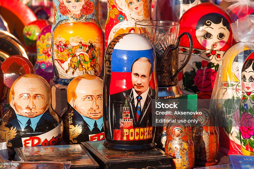 Russian traditional nested dolls "matryoshka" with portrait of Putin V.V. Moscow, Russia - March 31, 2008. Russian traditional nested dolls - matryoshka. Some dolls have a portrait of V. V. Putin, the Russian president. Dolls are on sale as souvenirs for tourists. Vladimir Putin Stock Photo