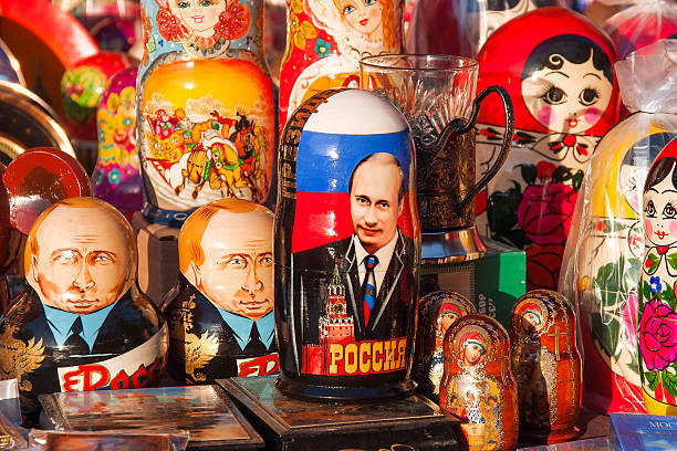 Russian traditional nested dolls "matryoshka" with portrait of Putin V.V. stock photo