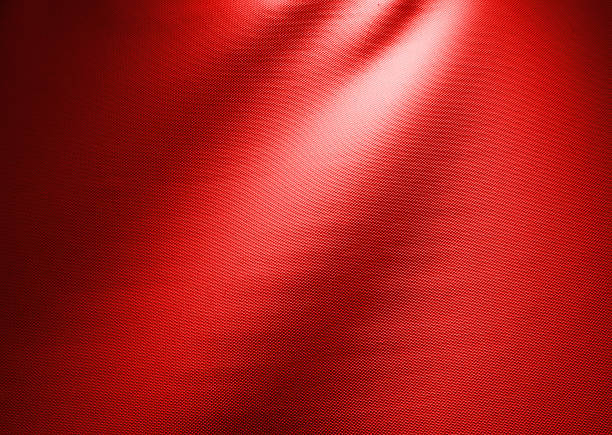istock Red waved fabric background photo texture 496739734