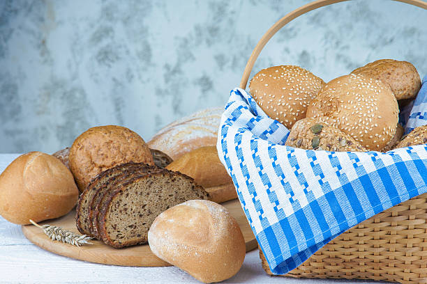 istock Fresh bread on a table and in a basket 496740884