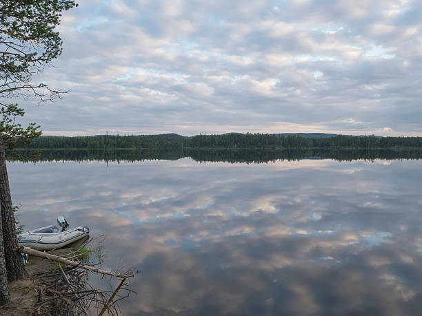 istock Lake in which the sky with clouds reflectes 496741210