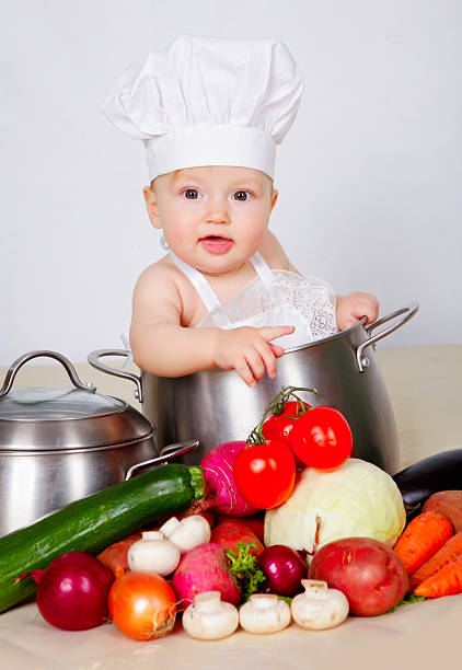 istock Baby cook in saucepan 496741330