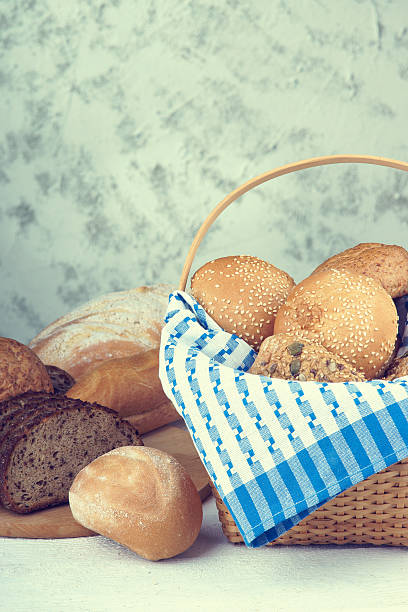 istock Fresh bread on a table and in a basket 496763958