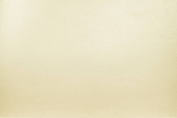 yellow pastel color paint on cement wall, Texture background