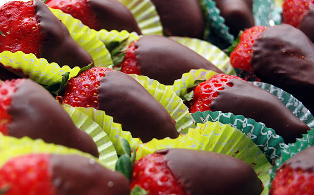 istock delicious strawberries with melted chocolate 496764824