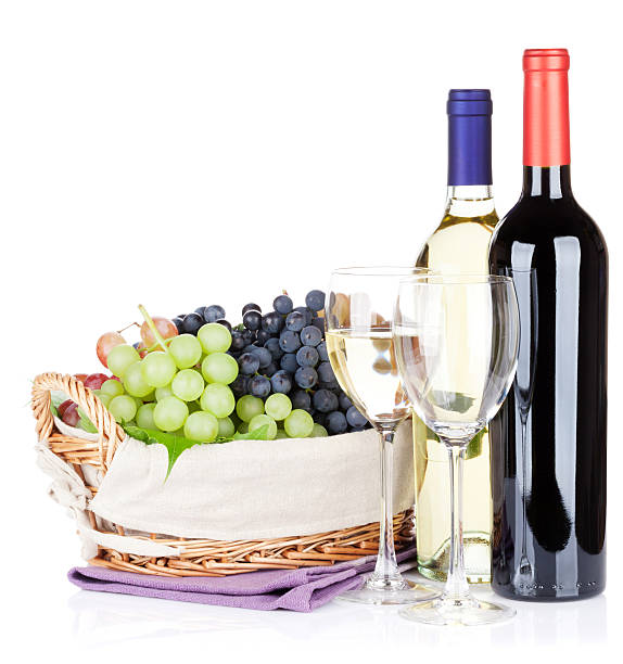istock White and red wine bottles and grapes 496766158