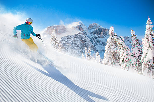 istock Skier skiing downhill in high mountains 496769558