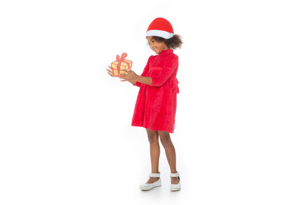 happy little smiling girl with christmas gift box